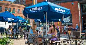Twin Cities restaurants push to keep patios in street, parking lot