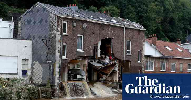 Belgian news crew capture moment flooded house partially collapses – video
