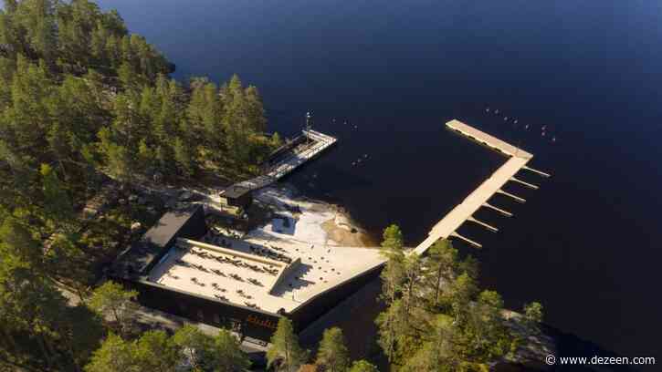 Studio Puisto completes wellness centre that steps down towards a lake