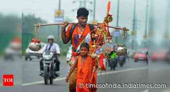 Coronavirus live updates: Akhara Parishad against Kanwar yatra amid pandemic - Times of India