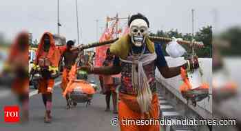 Coronavirus live updates: UP govt cancels Kanwar yatra amid Covid pandemic - Times of India
