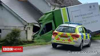 Waitrose food delivery van crashes into house in Cornwall - BBC News