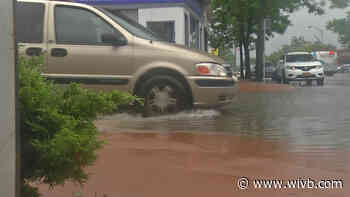 AAA urges drivers to slow down and never drive through standing water