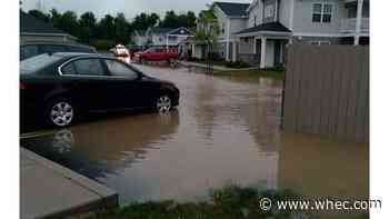 Beaver Creek flood waters close in on Farmington apartments