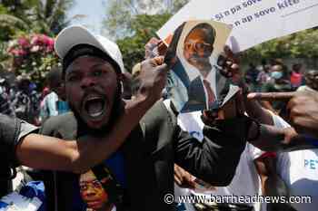 Hundreds greet Aristide on returns to troubled Haiti - Barrhead News