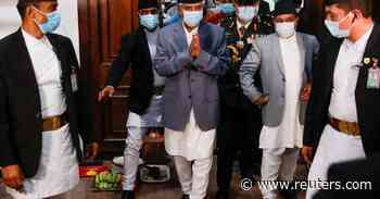 Nepal's new PM wins confidence vote amid coronavirus crisis - Reuters