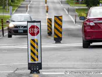 Egan: Stakes narrow 414 streets, a forest of plastic to 'calm' traffic - Ottawa Citizen