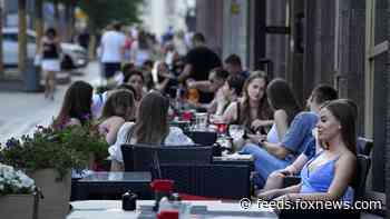 Moscow lifts dining restrictions; Russia hits record deaths