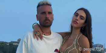 Scott Disick Cuddles Up to Girlfriend Amelia Hamlin in New Photo with His Son Reign: 'Great Night' - PEOPLE