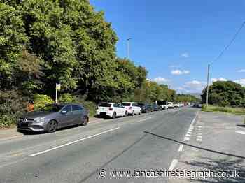 Police issue 20 fines as reservoir swimmers block pavement and obstruct carriageway on Grane Road