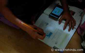 NGOs, volunteers step in with gadgets, help students attend online classes - The Hindu