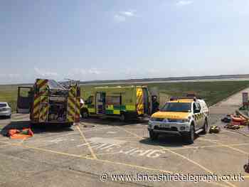 Two stuck people rescued from mud on one of hottest days of year so far