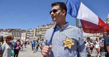 French anti-vax protesters condemned for using Nazi icon     - CNET