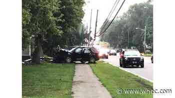 Deputies: SUV cut off by 'unknown vehicle', crashes into pole, house in Penfield