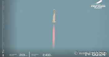 First crewed Blue Origin flight takes off into space video     - CNET