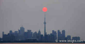 Smoky skies make for rare bright red sun in Toronto and the photos are surreal - blogTO