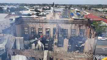 Backpackers and beer return to Bundaberg one year after fire destroyed historic Federal hostel
