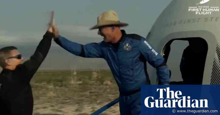 Jeff Bezos successfully completes space flight – video