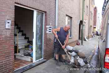 Terwijl Halen opruimt na de zondvloed, blijven 26 militairen aanwezig voor mogelijke evacuatie - Het Nieuwsblad