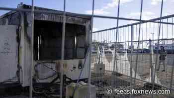 Dutch court convicts men of torching virus testing center during protests