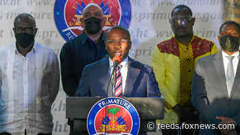 Official: Haiti's interim prime minister to step down