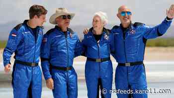 What was accomplished with Bezos, Branson's space flights?