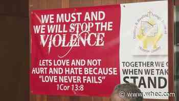 Gates and Chili participating in Stop the Violence rally