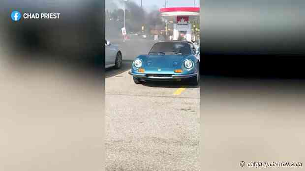 Ferrari catches fire in parking lot outside Cattle Baron restaurant