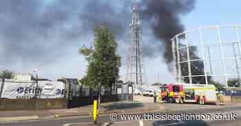 Mitcham fire live: Smoke pours out of gasholder opposite Asda