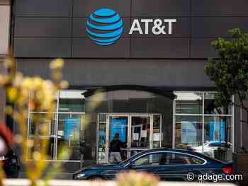 AT&T tops earnings estimates on surging subscriber growth