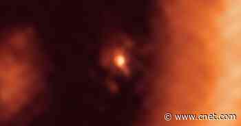 Astronomers see 'moon-forming disk' around distant exoplanet for the first time     - CNET