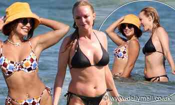 Vanessa Hudgens and Heather Graham showcase wow in bikinis as they frolic in the sea in Sardinia