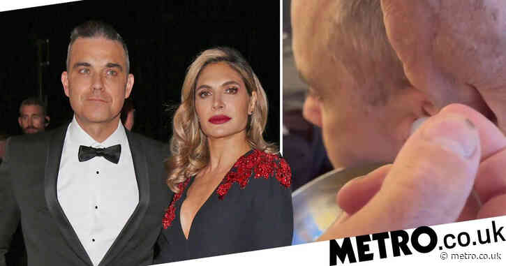 Robbie Williams fans disgusted as wife Ayda Field films grim earwax removal procedure