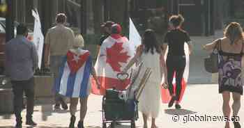 Cubans living in Calgary gather to protest government crackdown in their homeland