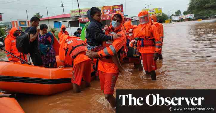 India floods: rescuers search for survivors among mud and debris