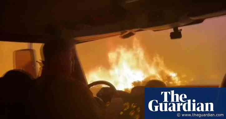 Firefighters escape Tamarack wildfire by driving through flames – video