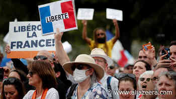 Thousands protest amid global anger against COVID restrictions - Al Jazeera English