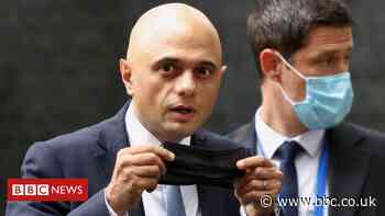 UK minister apologises for 'cower' Covid remark