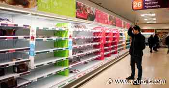 'Pingdemic' grips Britain as fears of food shortages grow - Reuters