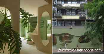 irregular curves bring the nature inside this pastel green café in china - Designboom