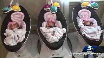 Family celebrates birth of rare identical triplets
