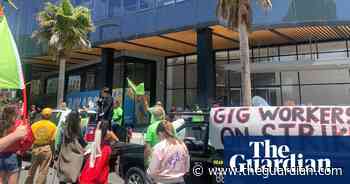 Uber and Lyft drivers join day-long strike over working conditions