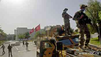 Tunisia on edge after president imposes curfew, suspends parliament