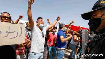 Tunisian president ousts officials amid protests and COVID-19 crisis