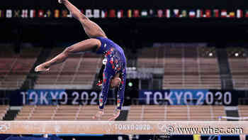 Olympic champion Simone Biles out of team finals with apparent injury