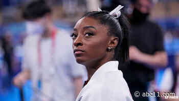 Olympic champion Simone Biles out of team finals with apparent injury