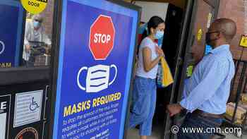 CDC tells vaccinated Americans in Covid hot spots to mask up again