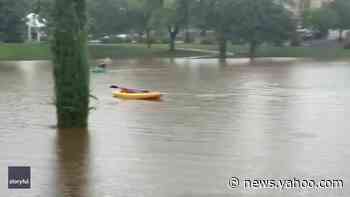 Kids Have 'a Blast' Kayaking on Flooded Arizona Street - Yahoo News