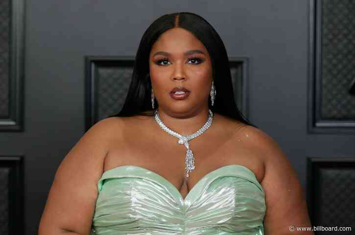 Lizzo Jokes She’s Expecting a Baby With Chris Evans: ‘We’re Going to Have a Little America!’