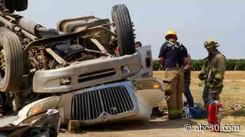 Driver rescued after big rig overturns in Merced County